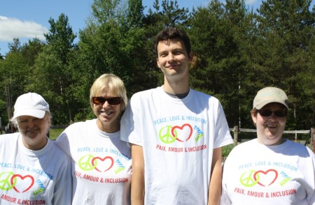 The Gardening Crew wearing Peace Love and Inclusion shirts