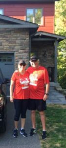 Two people pose for a photo before the race.