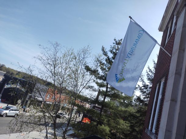 Community Living flag flies on a flag pole on Town Hall.