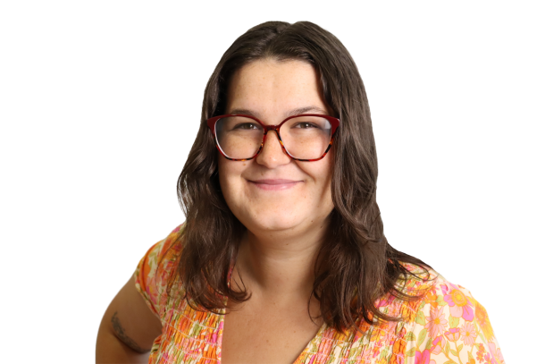 Headshot of Jamie Arnold, a woman with long brown hair and glasses with red frames.